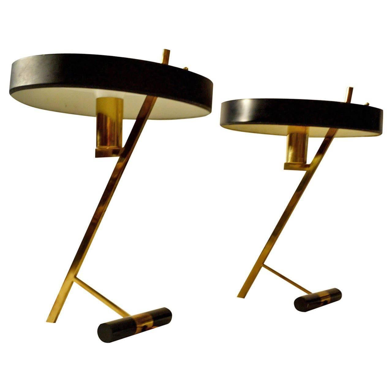 Iconic table or desk lamps in brass and black metal shade designed in 1955 by Louis Kalff for Philips. On the top it shows the manufacturers tag.
They are in great condition, the black shades have been recoated.
Louis Kalff was a multifaceted