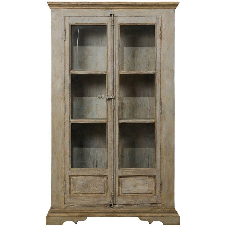 tall painted display cabinet of 19th century french windows and