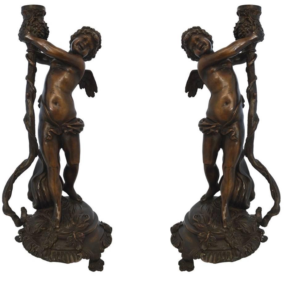 Pair of Tall Bronze Cherub Candleholders