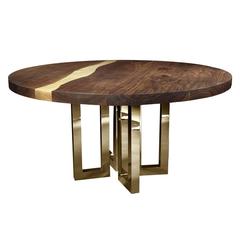 Elegant Round Table Rests on a Gorgeous Series of Brass Legs 1
