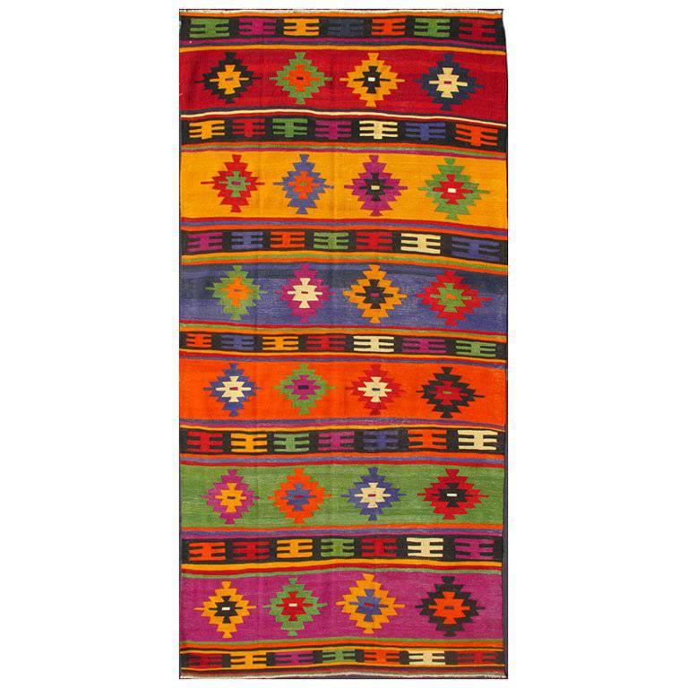 Colorful and Vibrant Turkish Vintage Kilim Rug with Repeating Diamond Pattern For Sale