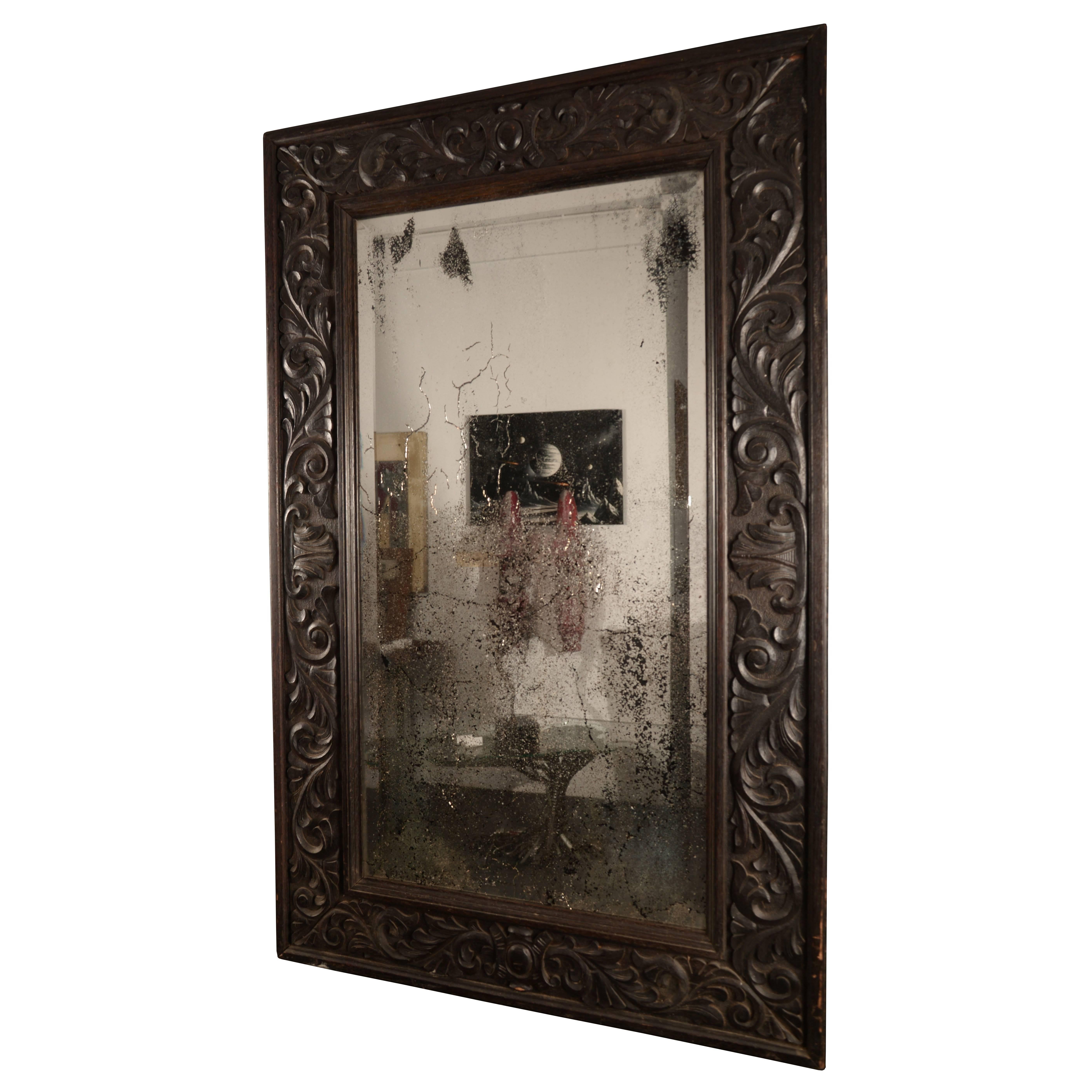 Carved Black Oak Mirror