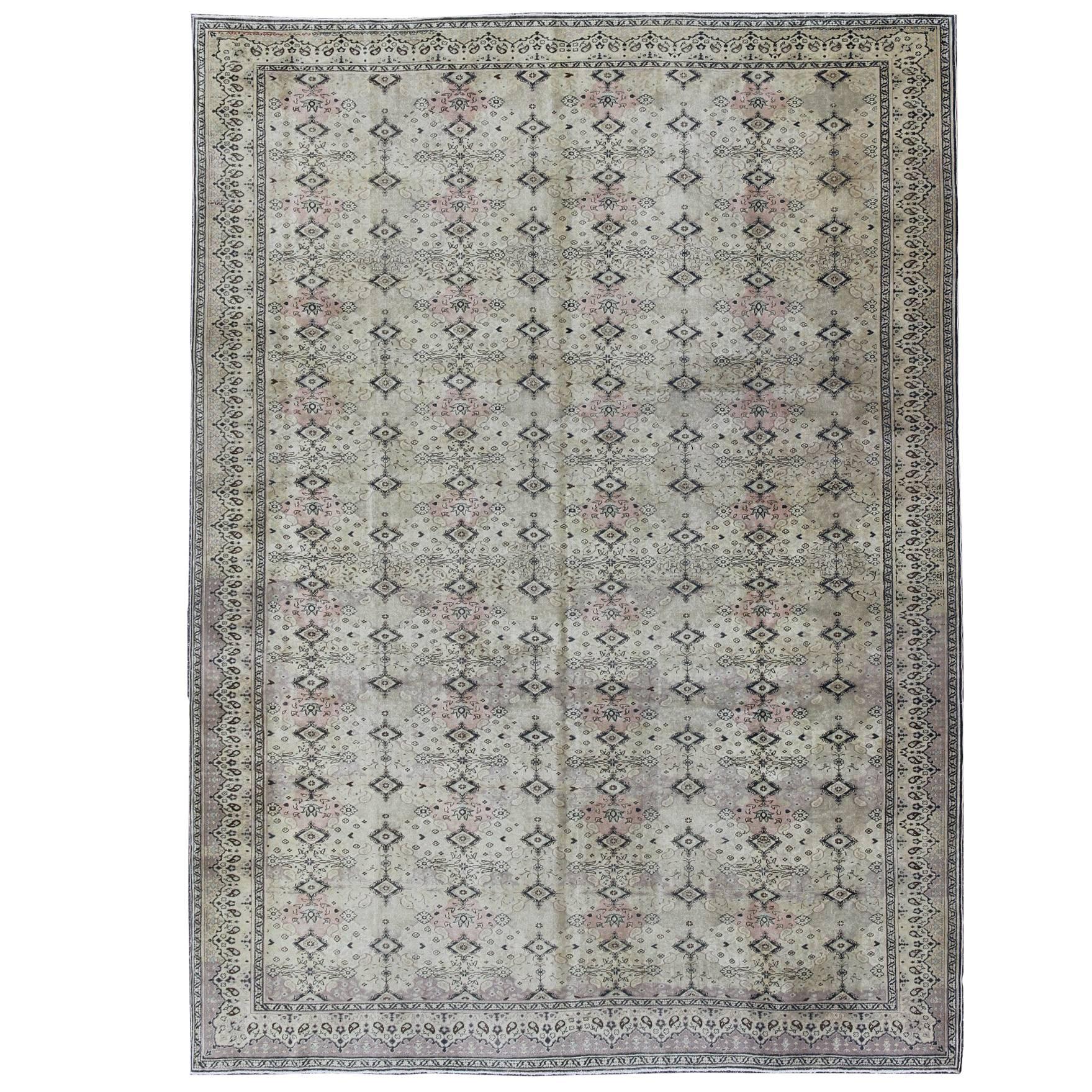Large Turkish Sivas Rug with Repeating Diamond Motifs Set on Ivory Ground For Sale