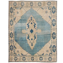 Blue and Champagne Colored Vintage Oushak Rug with Central Medallion Design