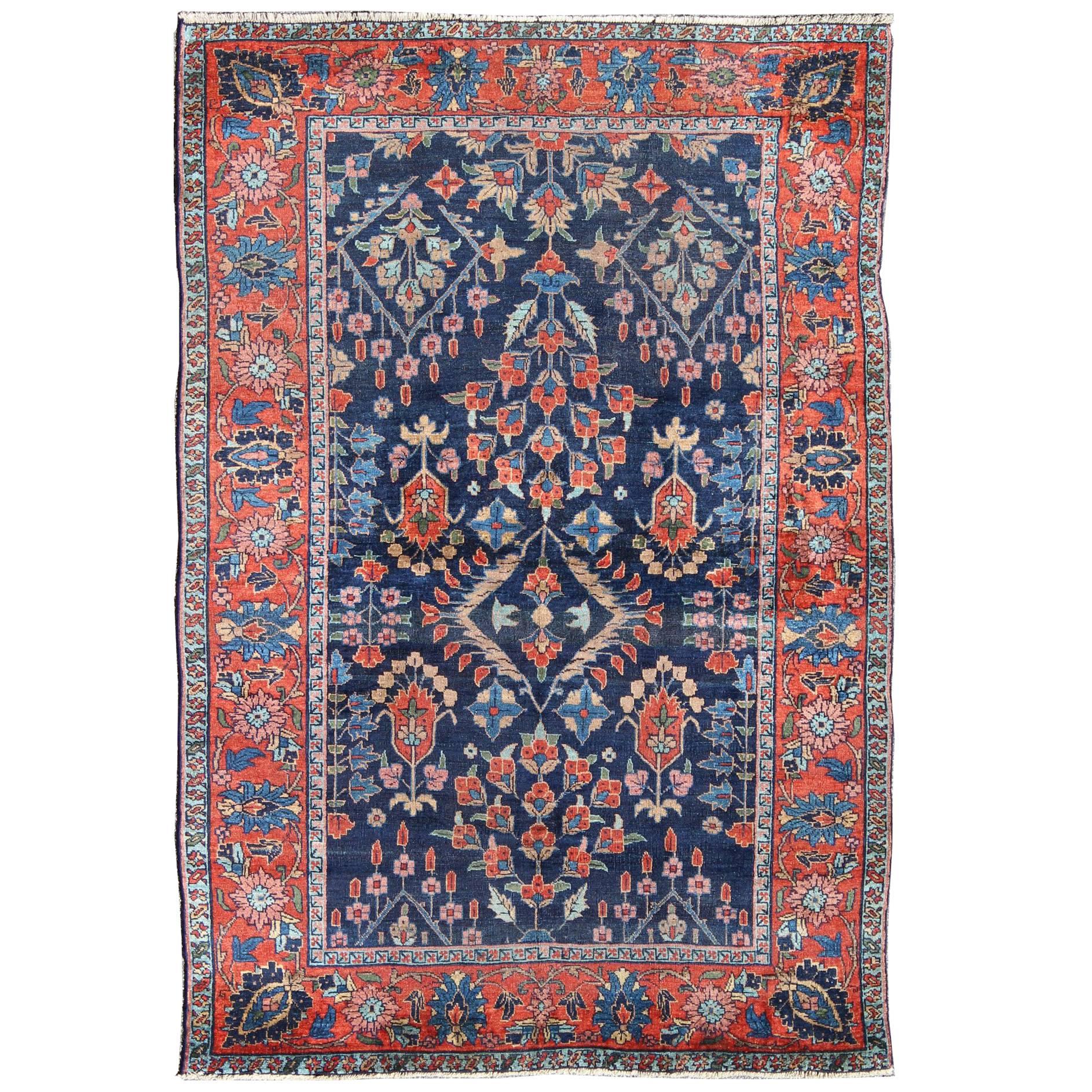 Antiker persischer Täbriz-Teppich mit botanischen Elementen in Marineblau, Rot-Orange im Angebot