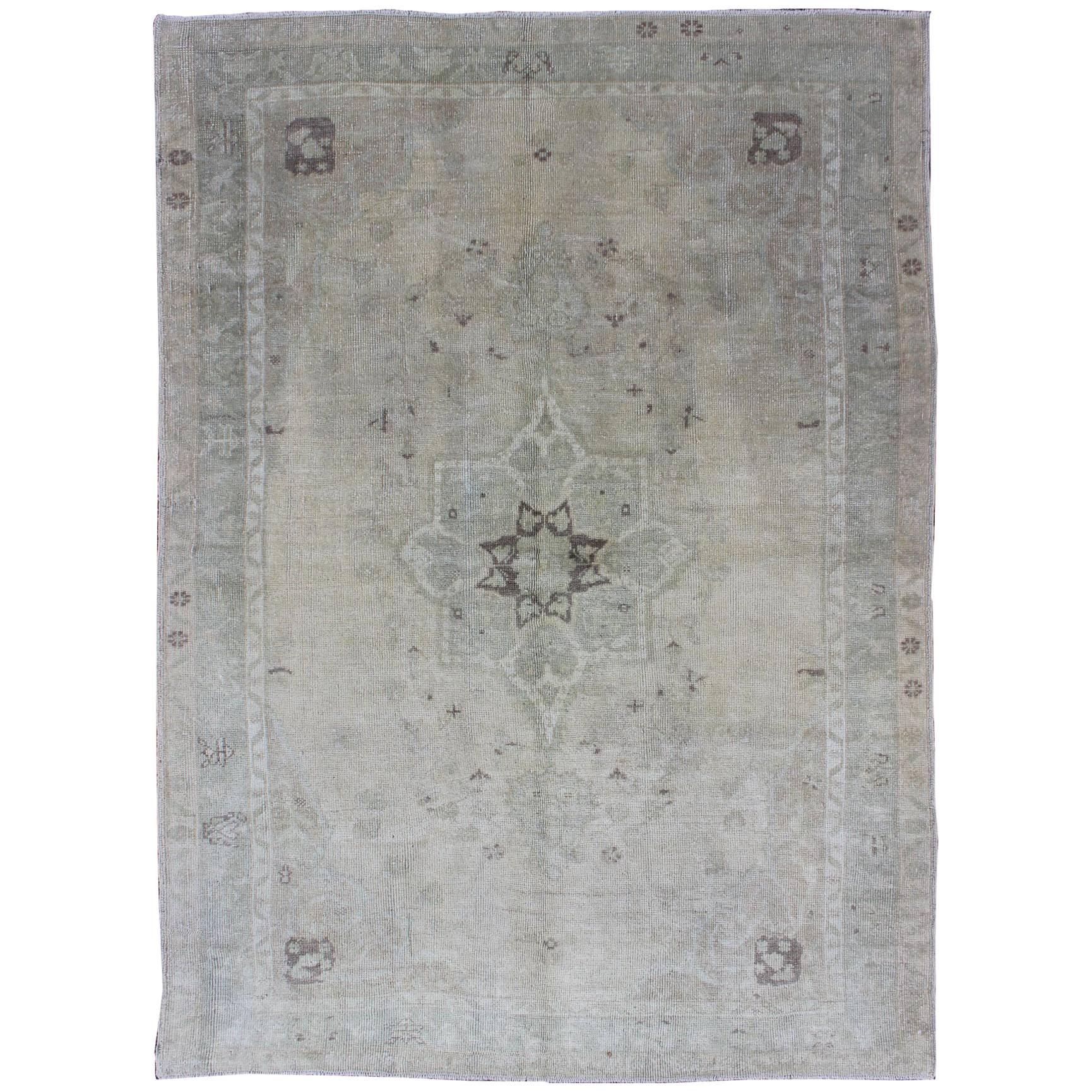 Muted Turkish Oushak Carpet with Center Medallion Design in Grey, Sand & Taupe For Sale