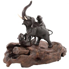 Groupe d'éléphants et de tigres en bois et bronze de la période Meiji