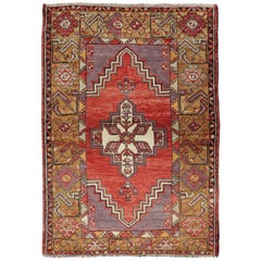 Geometric Vintage Turkish Oushak Carpet in soft Red, Light Purple, & Gold Border