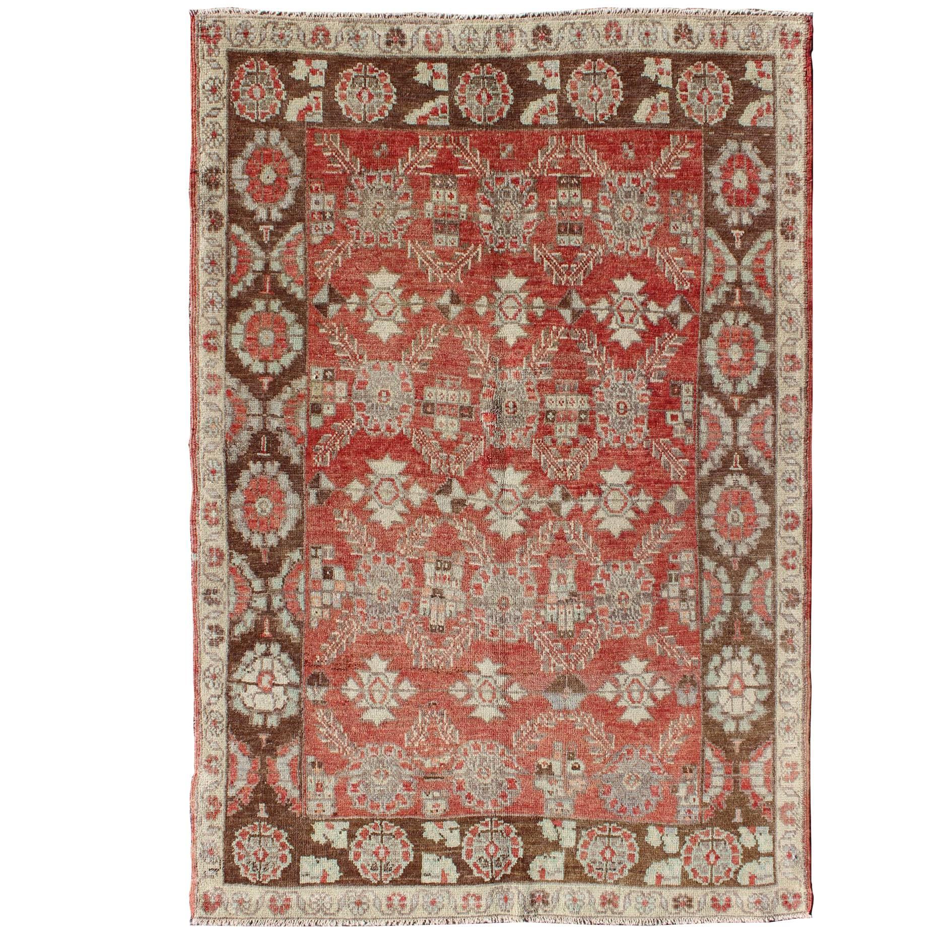Oushak Rug With Interconnected Floral Designs in Red, Brown & Light Green For Sale
