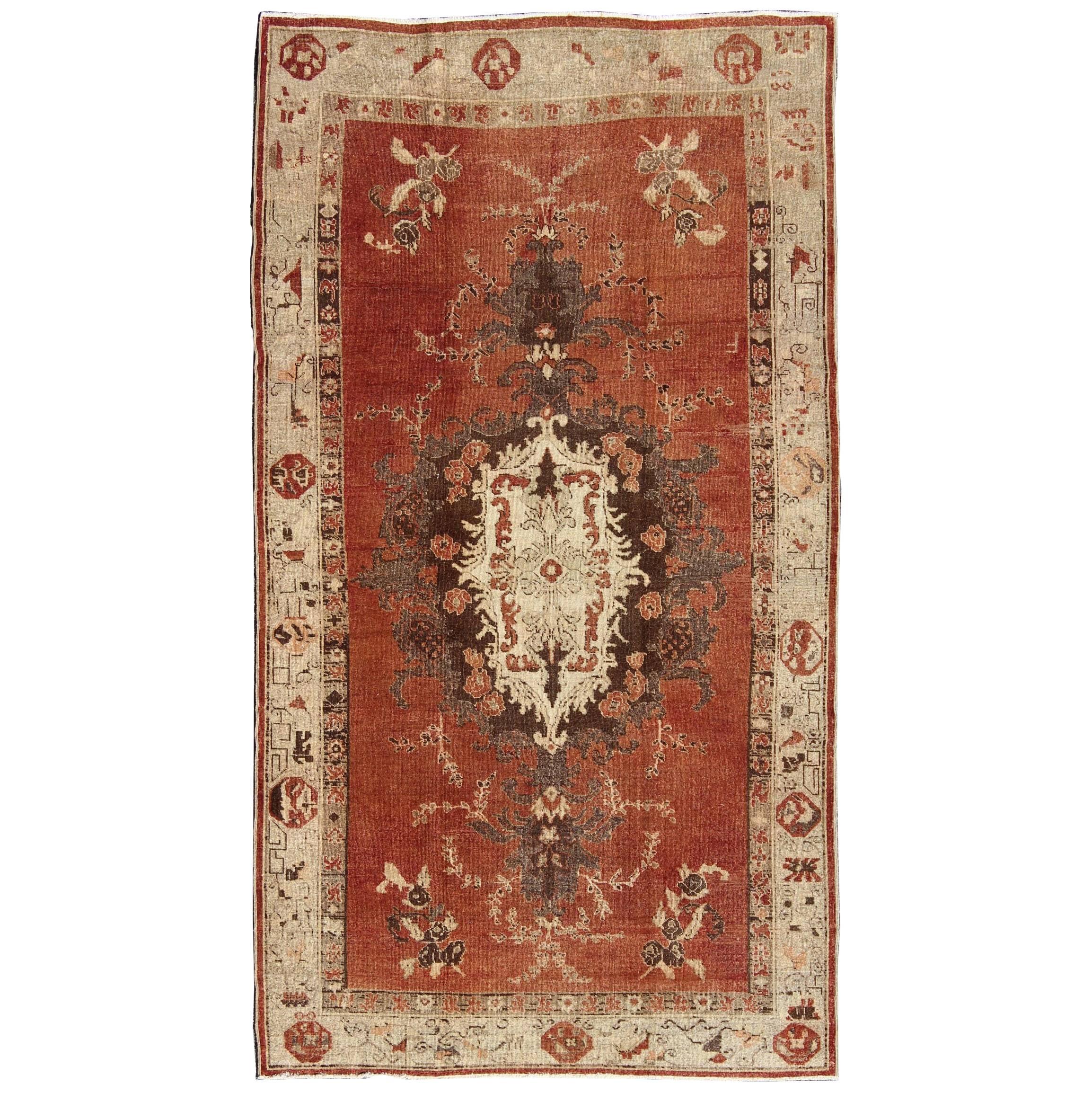 Vintage Oushak Carpet from Turkey with Faint Red Field and Floral Medallion For Sale