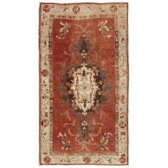 Vintage Oushak Carpet from Turkey with Faint Red Field and Floral Medallion