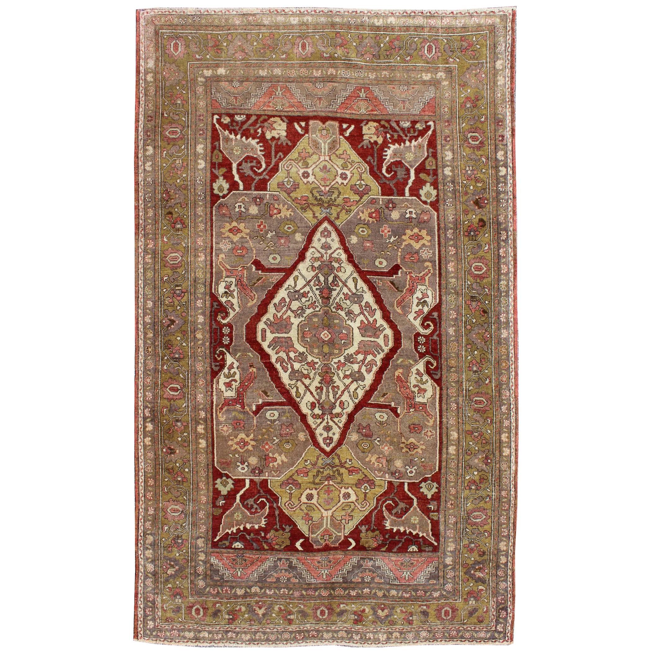 Unique Turkish Oushak Carpet with Medallion Design and Intricate Floral Motifs