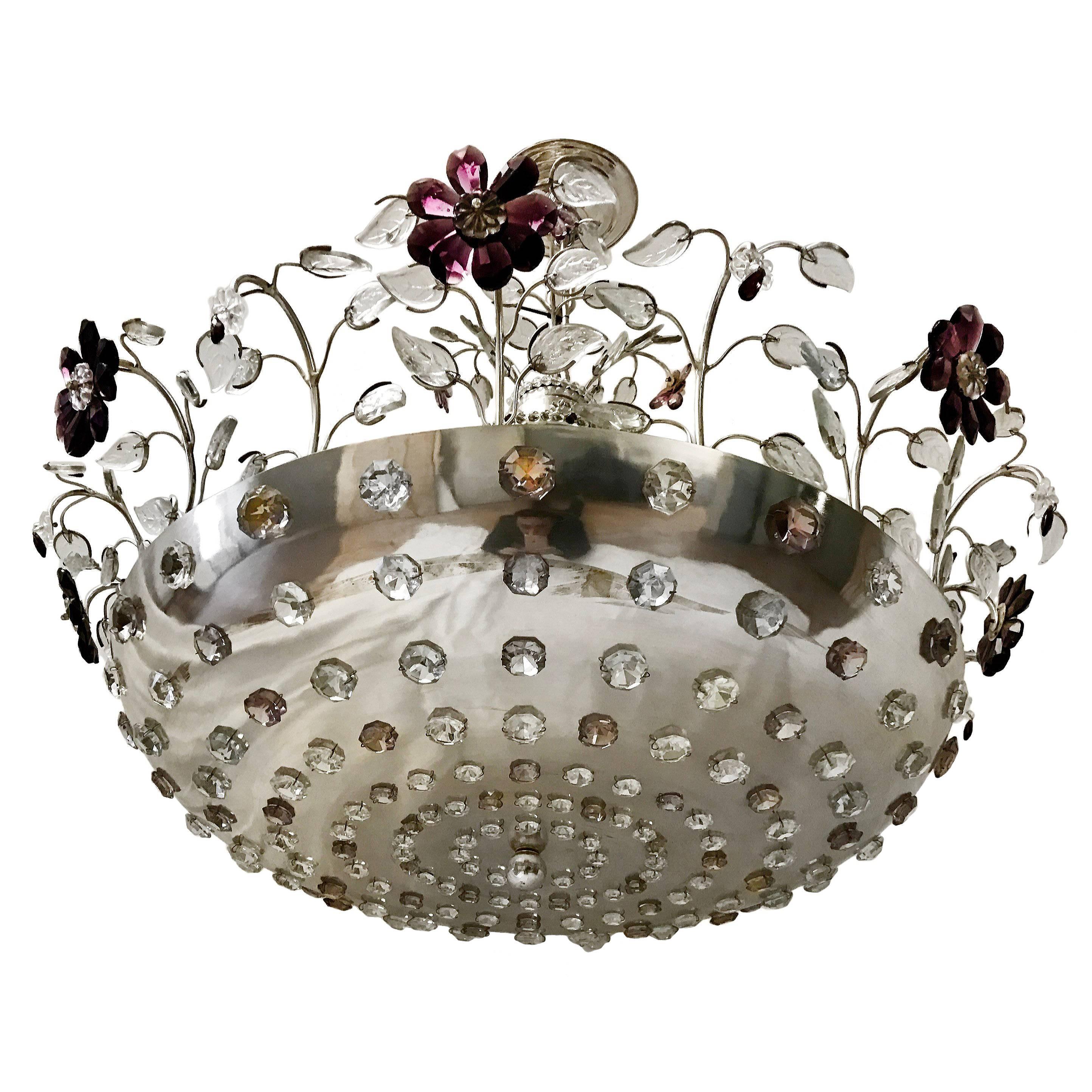 Paire de luminaires en métal argenté avec fleurs d'améthyste. Vendu individuellement.