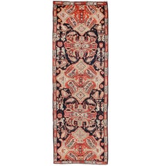 Tapis de couloir caucasien ancien Karabagh à fond noir, orange, vert et saumon