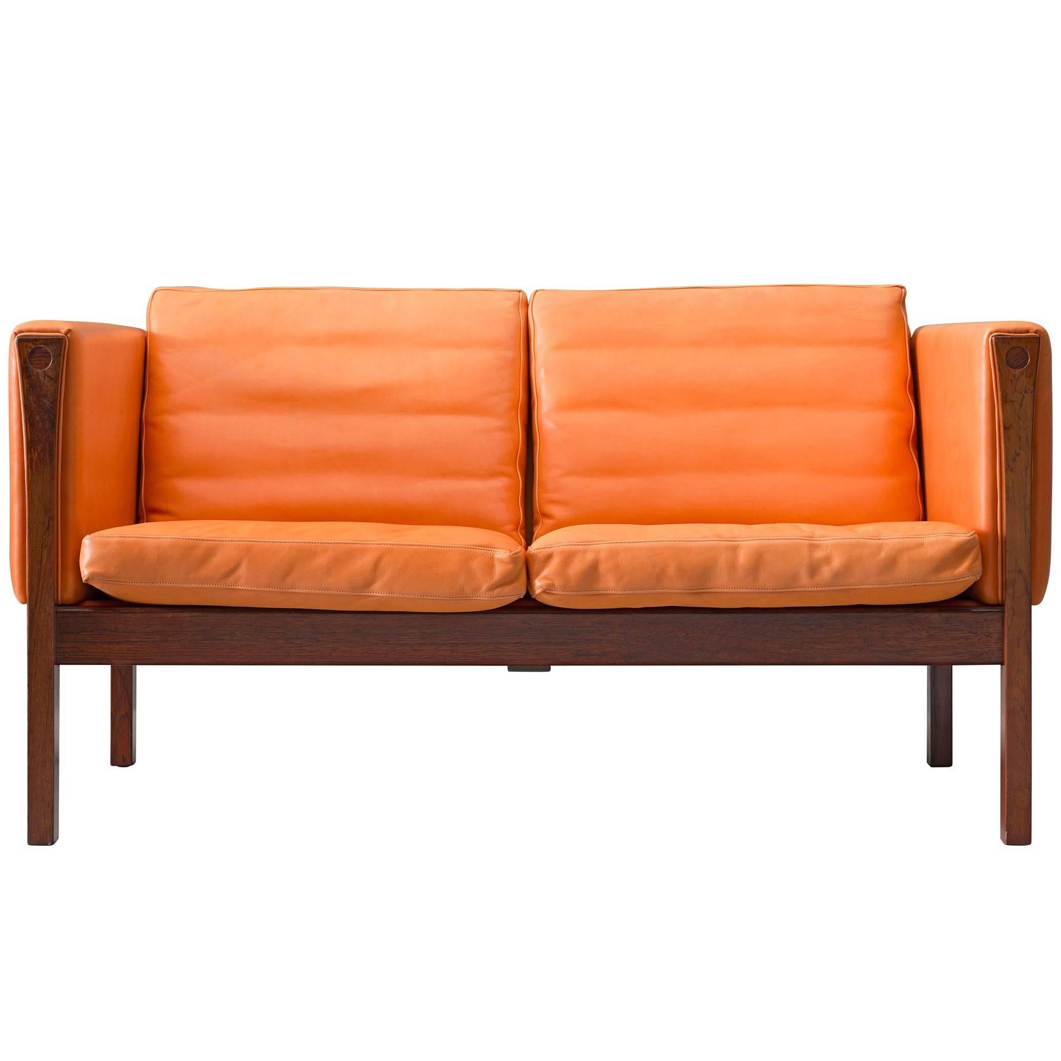 Reupholstered Hans Wegner Sofa with a Rosewood frame, Model AP-63-2