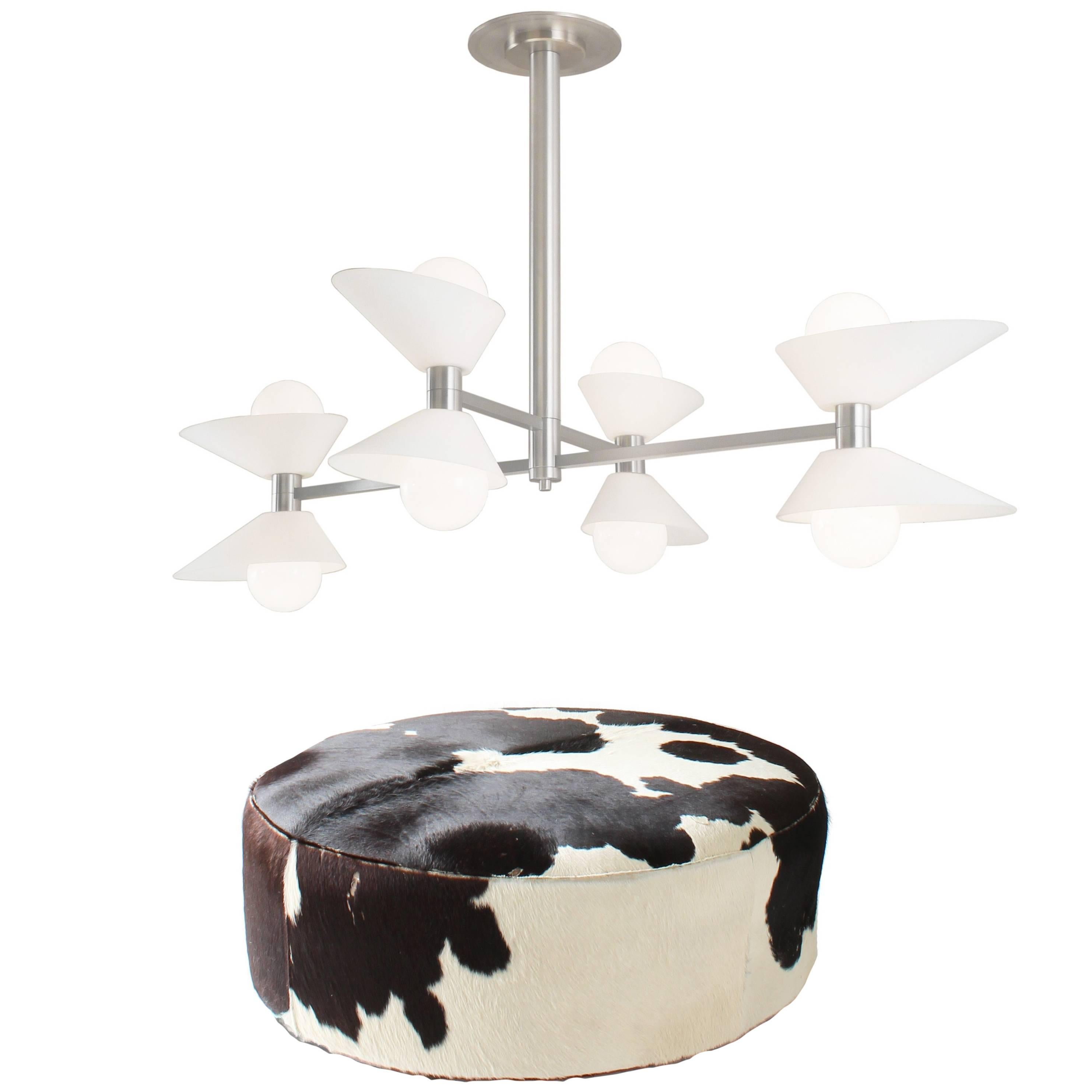 Black and White Pony Hide Ottoman with Mid-Century Modern Avocado Chandelier For Sale