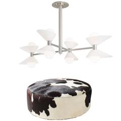 Vintage Black and White Pony Hide Ottoman with Mid-Century Modern Avocado Chandelier