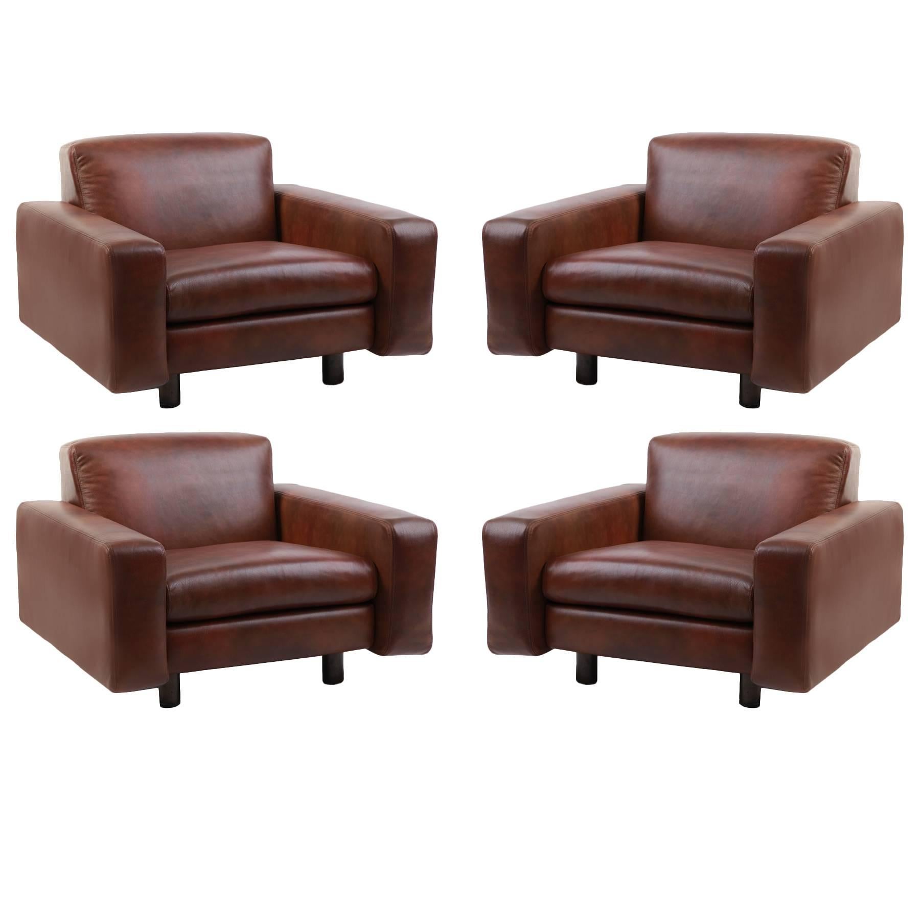 Four Metropolitan Leather and Bronze Lounge Chairs