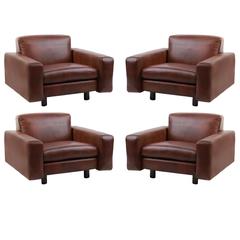 Four Metropolitan Leather and Bronze Lounge Chairs 12