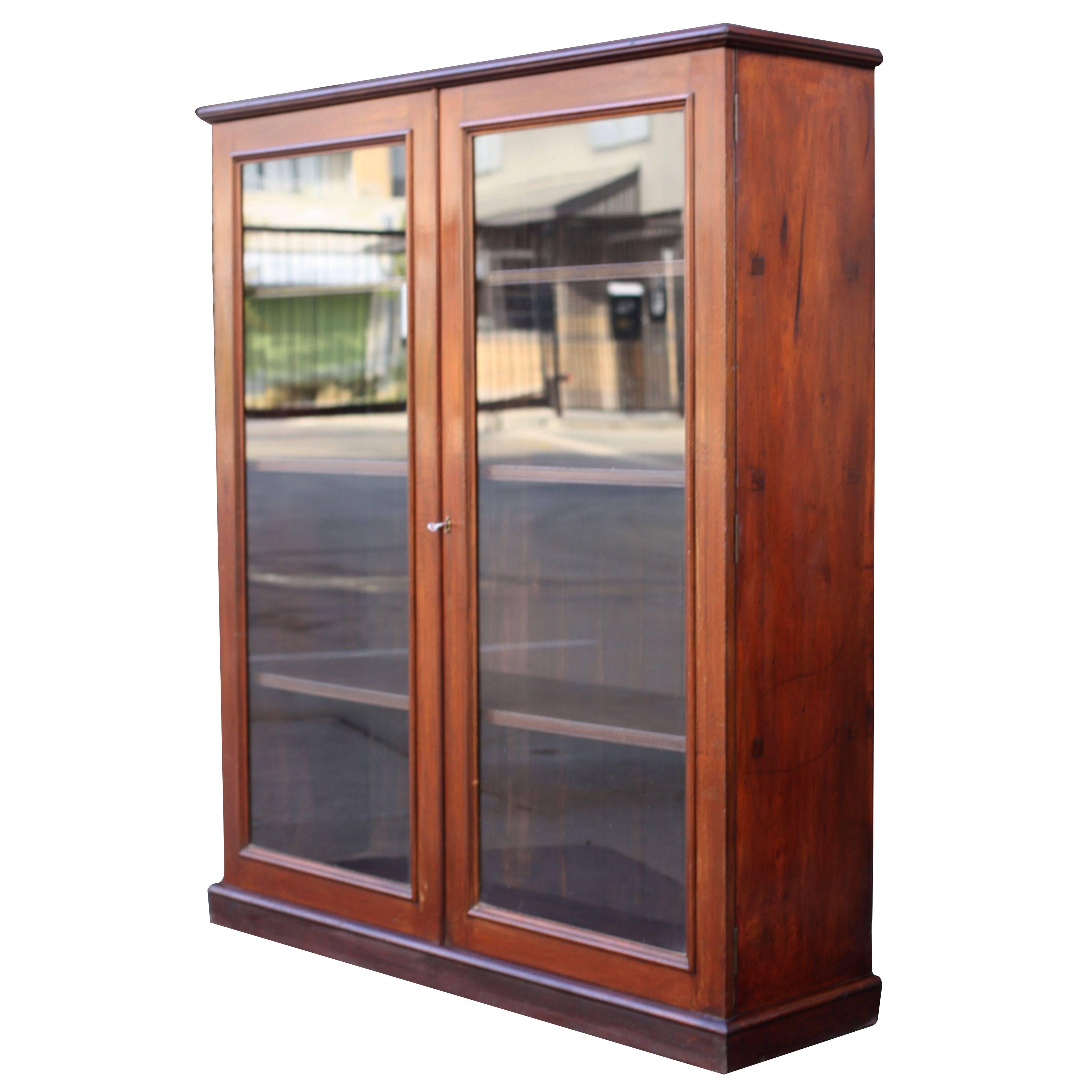 English Standing Bookcase of Mahogany with Glazed Doors