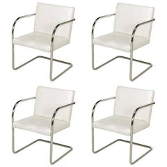 Four Thonet White and Chrome Cantilever Dining Chairs