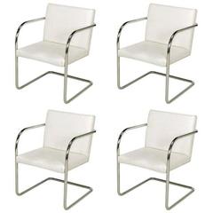 Four Thonet White and Chrome Cantilever Dining Chairs