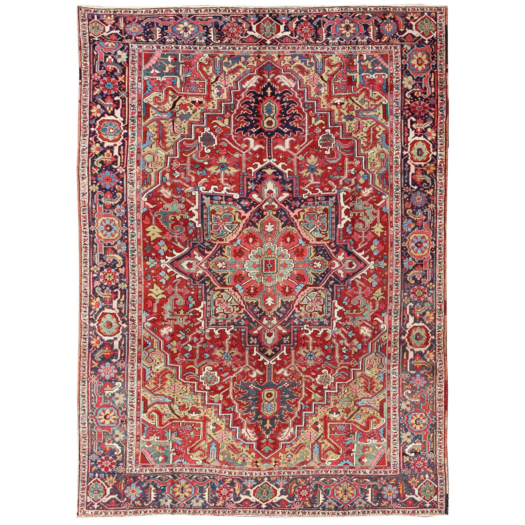 Antique Heriz Carpet with Stylized Floral Motifs and Complementary Border For Sale