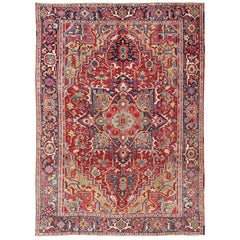 Antique Heriz Carpet with Stylized Floral Motifs and Complementary Border