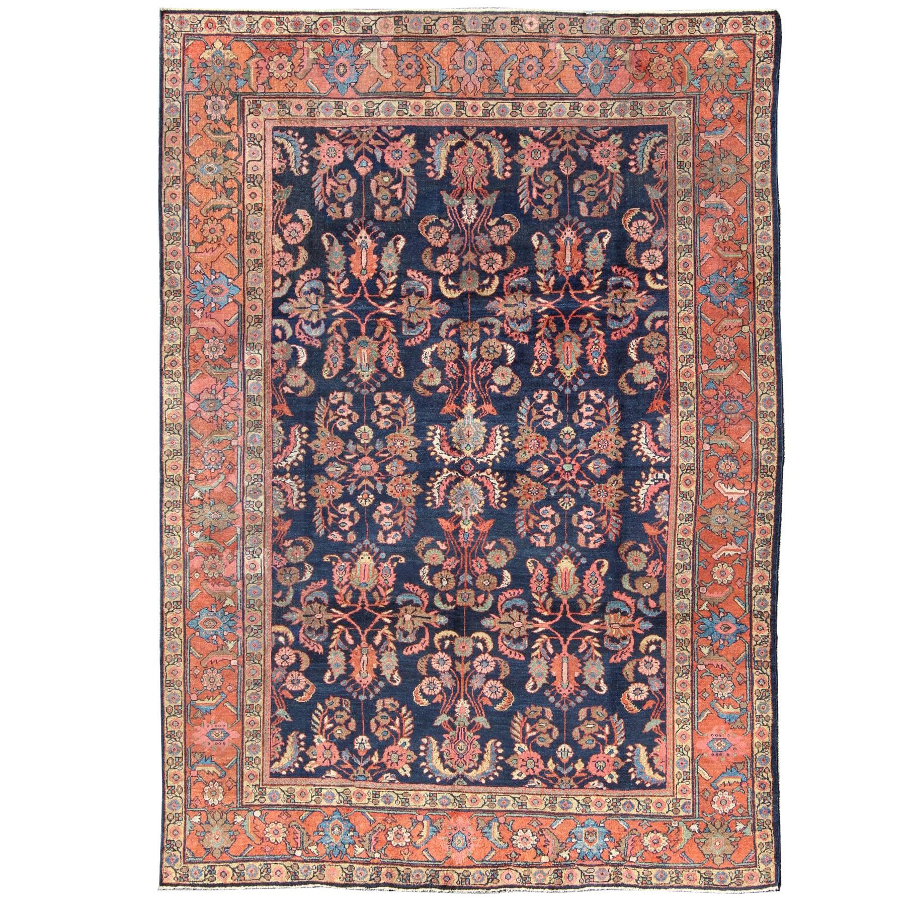  Antique Mahal Rug with Dark Blue Field & Coral Red Border with Floral Motifs For Sale