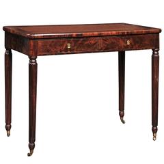 English Mahogany Desk on Casters with Brown Leather Top over Two Drawers, 1850s