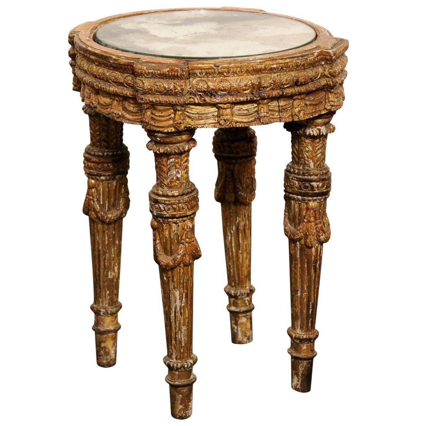 Italian Mid-18th Century Giltwood Table with Mirrored Top over Four Carved Legs
