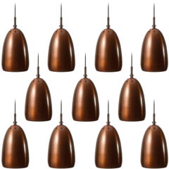 One of Nine Mid-Century Modern Patinated Copper Pendant Lights, 1960