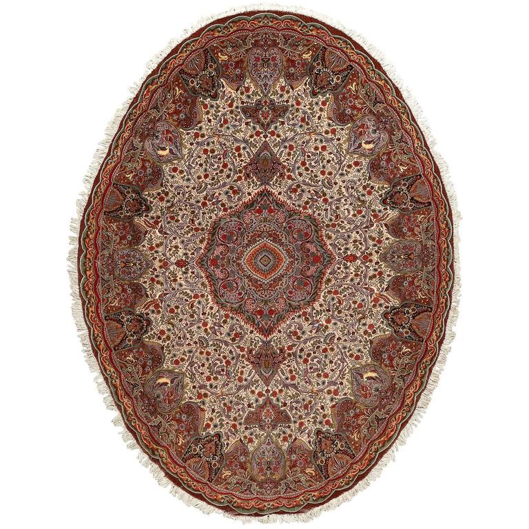 Oval Animal Motif Vintage Tabriz Persian Rug For Sale at 1stdibs