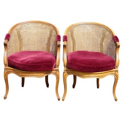 Pair of Carved Walnut and Caned Side Chairs