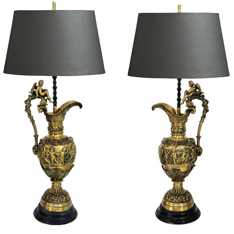 Pair of Figural Cherub & Rams Head French Neoclassical Bronze Ewer Table Lamps For Sale