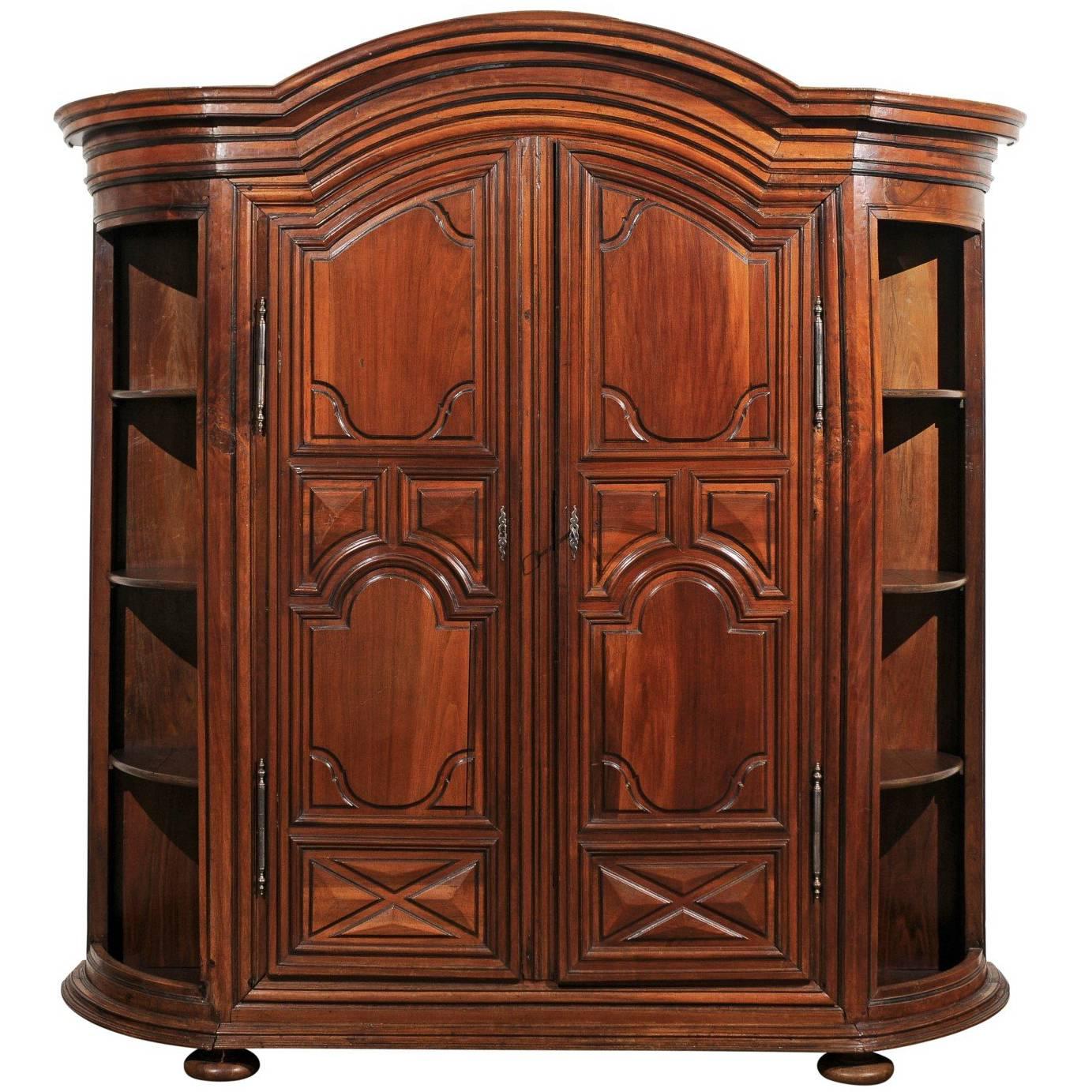 French 1820s Louis XIII Style Carved Walnut Armoire with Curved Open Shelves