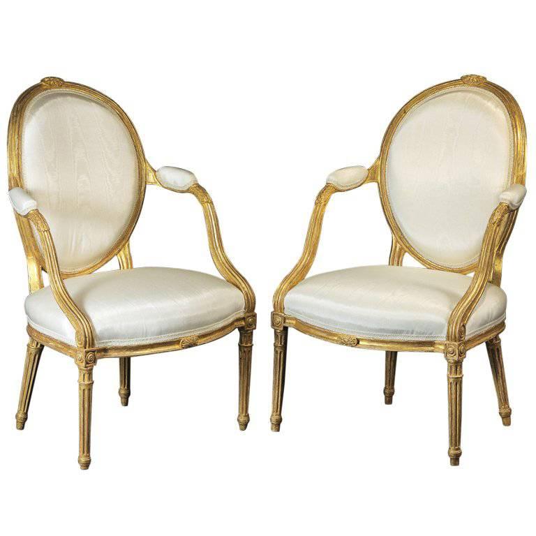 Fine Pair of George III Giltwood Oval Backed Armchairs For Sale