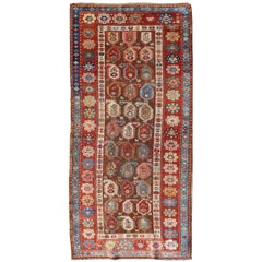 Antique Kazak with Paisley Design in Brown Background, Red, Blue Salmon Accents
