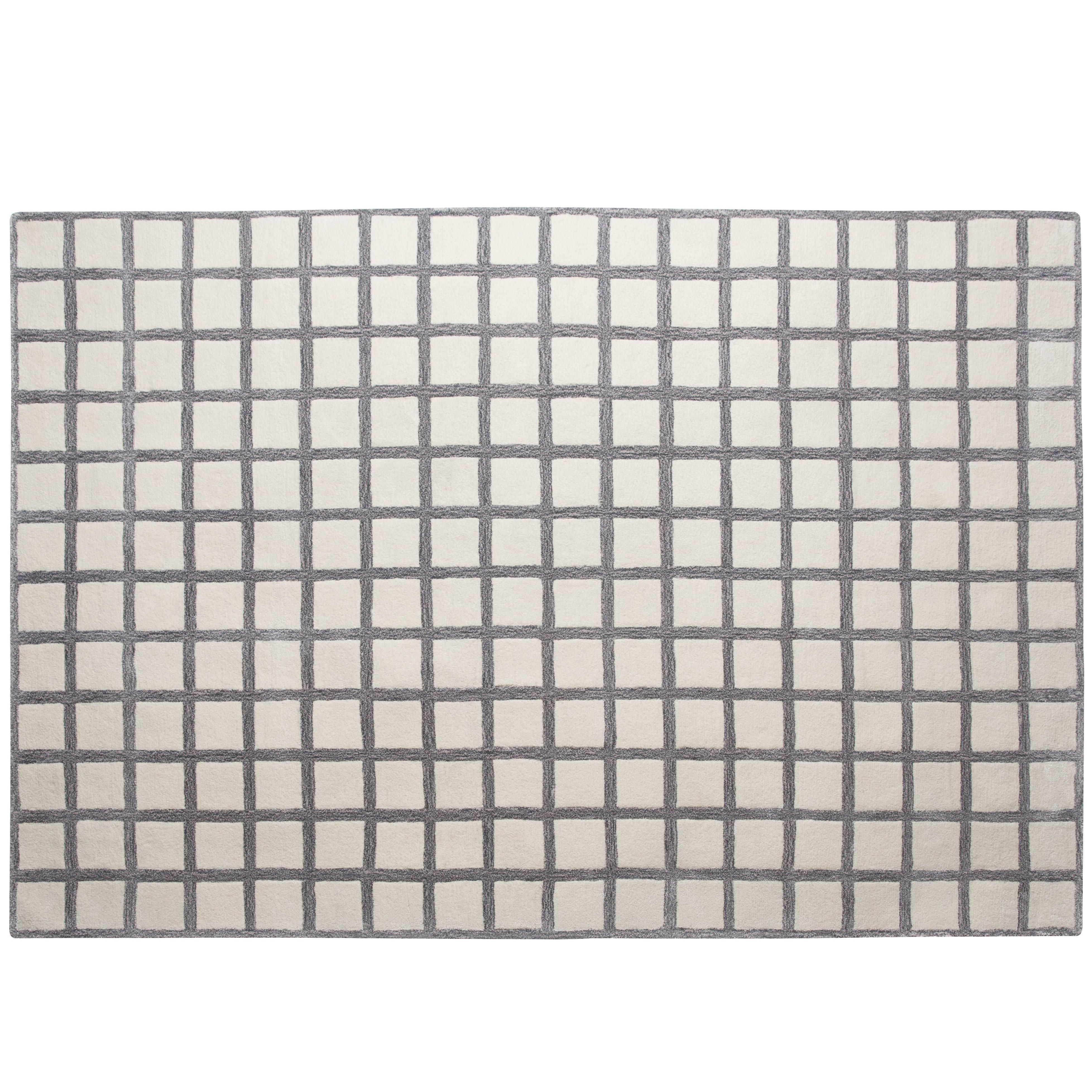 Tapis moderne gris neutre matelassé à la main imprimé grille géométrique Maschi