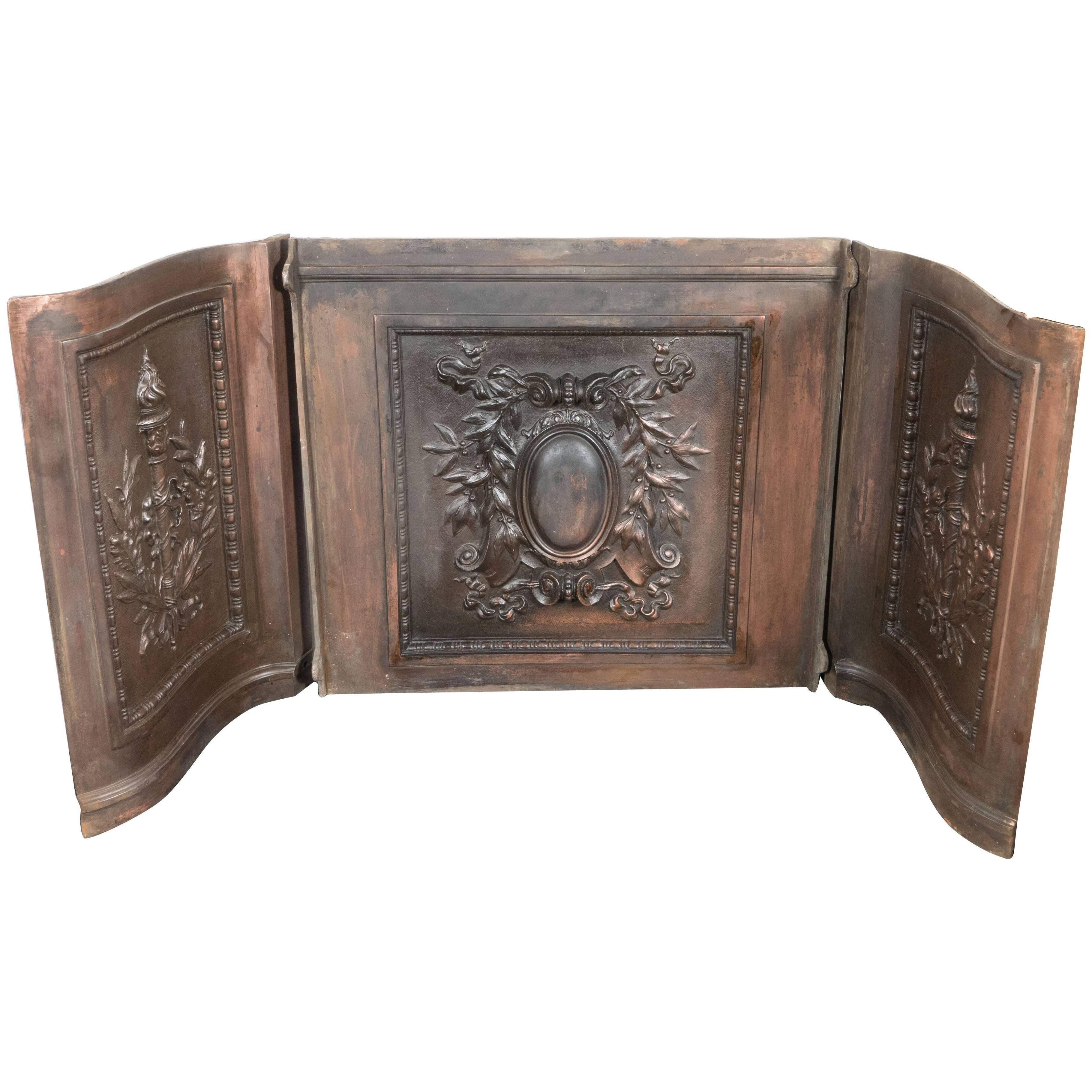 American Bronze-Plated Iron Fireback with Crest, Torch and Foliate Motifs For Sale