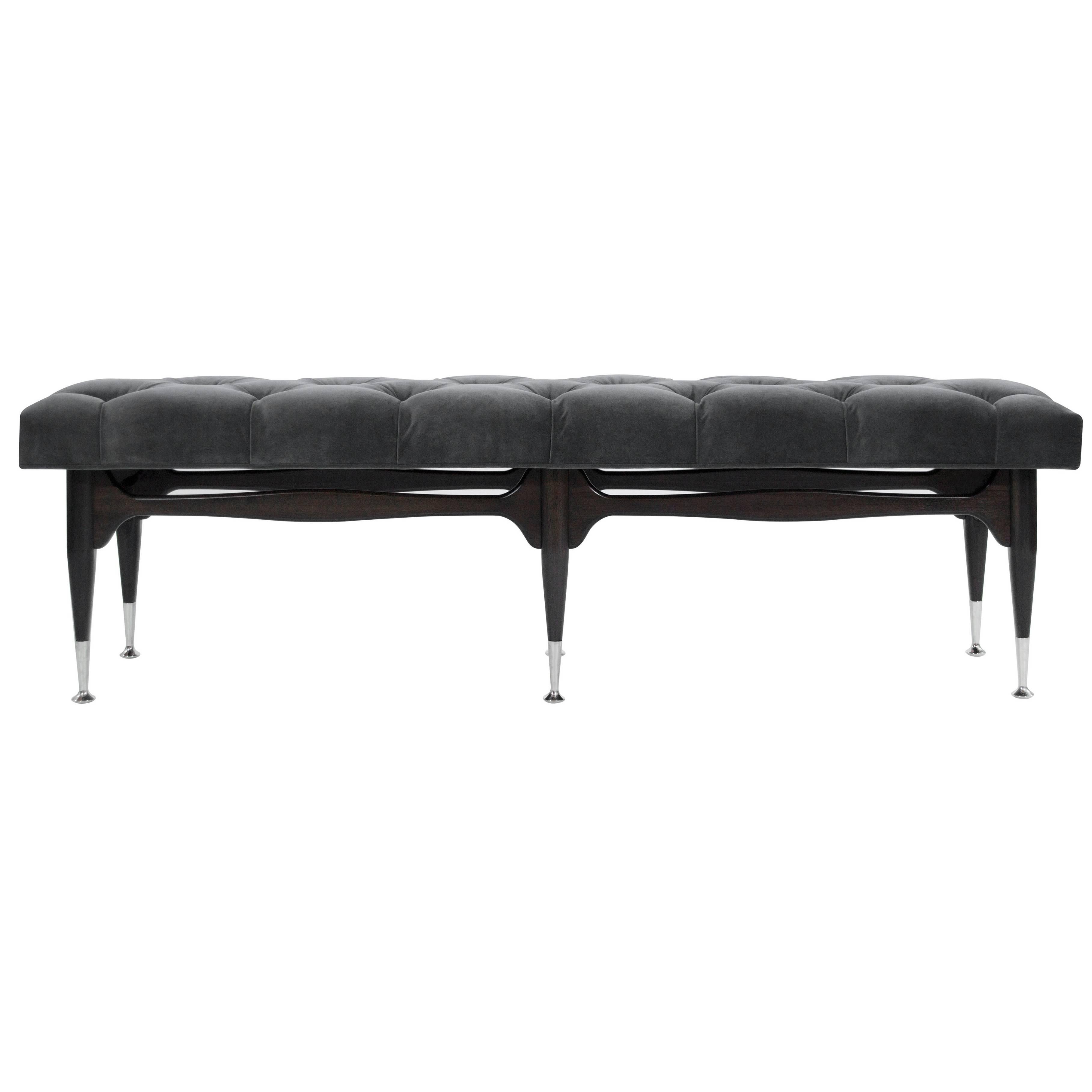 Mid-Century Modern sculpted mahogany bench, wood has been fully restored to its original espresso finish. Newly upholstered in tufted granite velvet. Nickel sabots newly polished. Pair available.