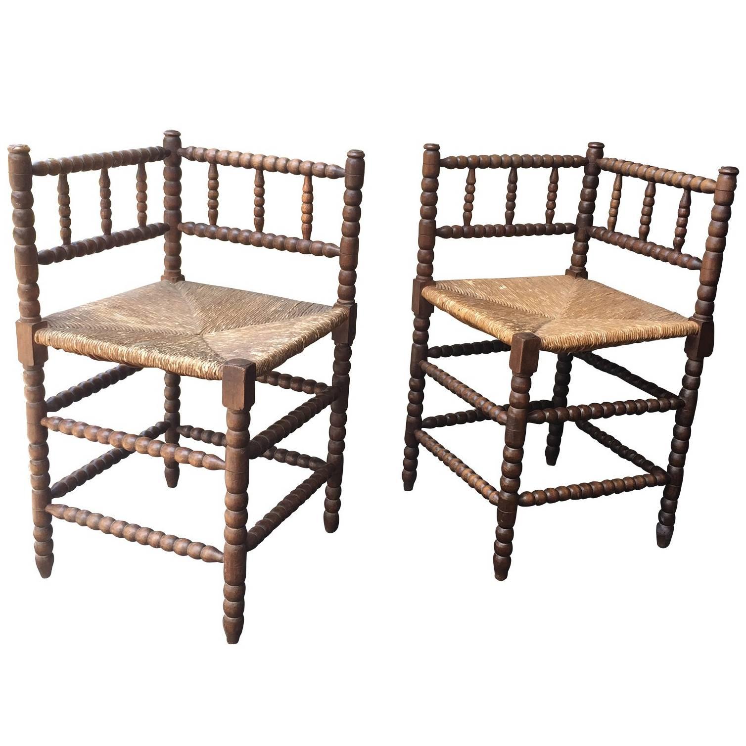 Pair of 19th Century Bobbin-Turned Stained Beechwood Rush Seat Corner Chairs