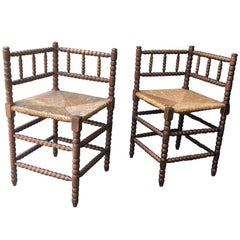 Antique Pair of 19th Century Bobbin-Turned Stained Beechwood Rush Seat Corner Chairs