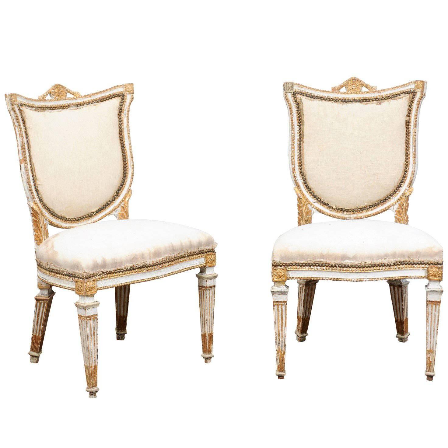 Pair of Italian Neoclassical Painted and Gilded Side Chairs with Shield Backs