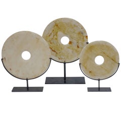 Set of Three Cream and Gold Stone Disc Sculptures, China, Contemporary