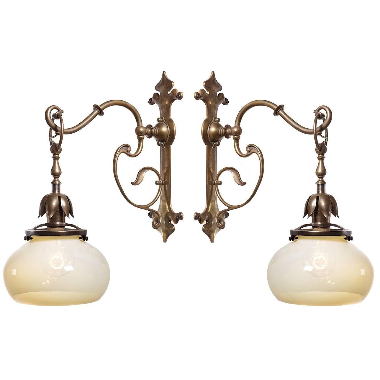 Pair of Vaseline and Bronze Art Nouveau Sconces