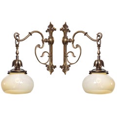 Pair of Vaseline and Bronze Art Nouveau Sconces