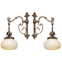 Pair of Vaseline and Bronze Art Nouveau Sconces