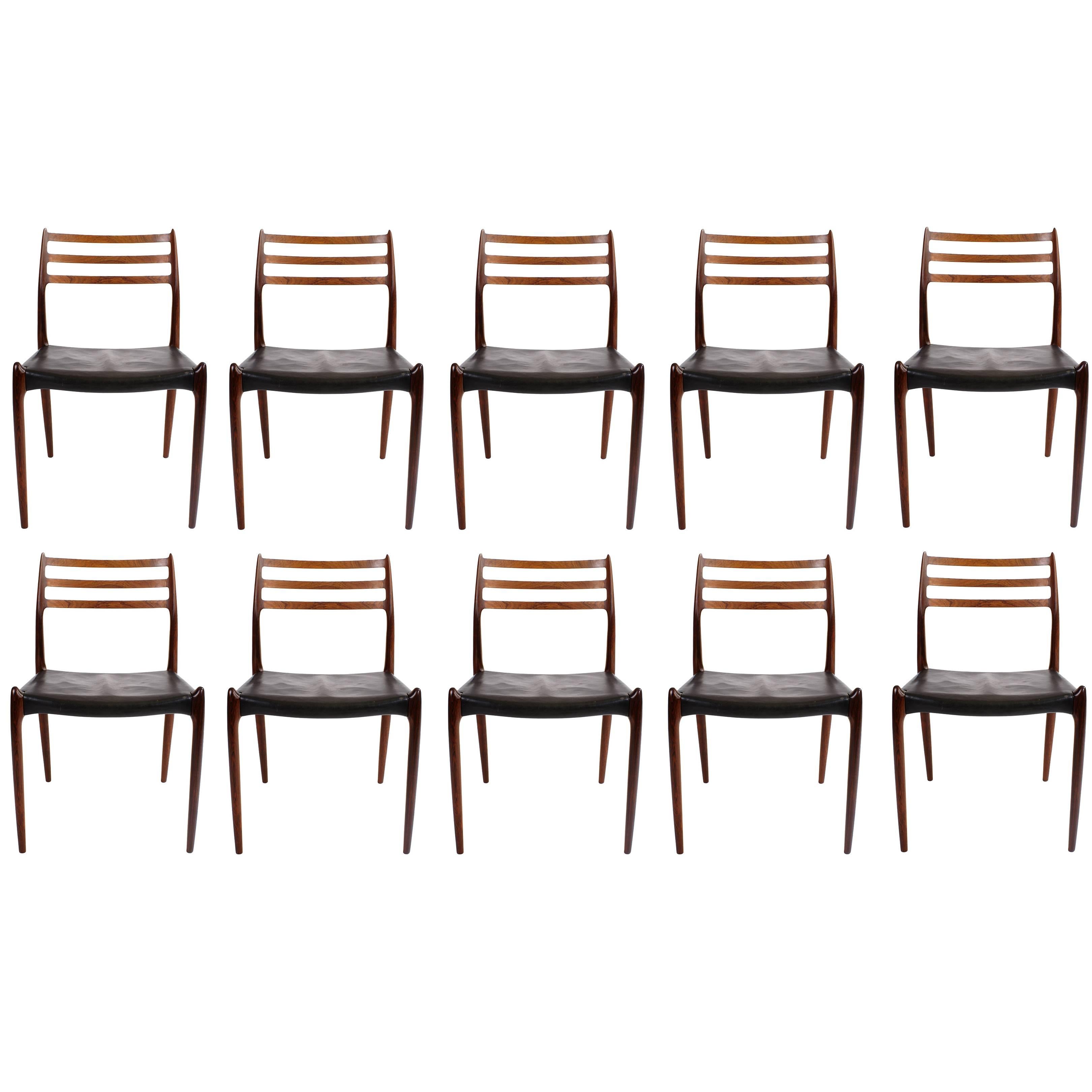 Niels O. Møller Set of Ten Dining Chairs in Rosewood and Black Leather