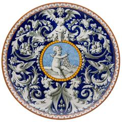 19th Century Richard Ginori Faience Charger Decorated with Putti